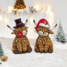 Ku oksedyr sittende hatt/blomst 9cm thumbnail